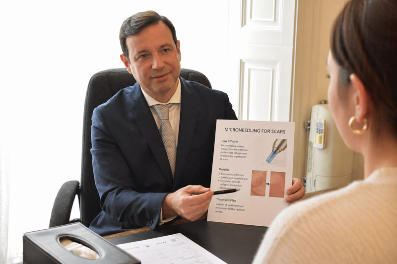 Microneedling consultation discussing scar texture improvement